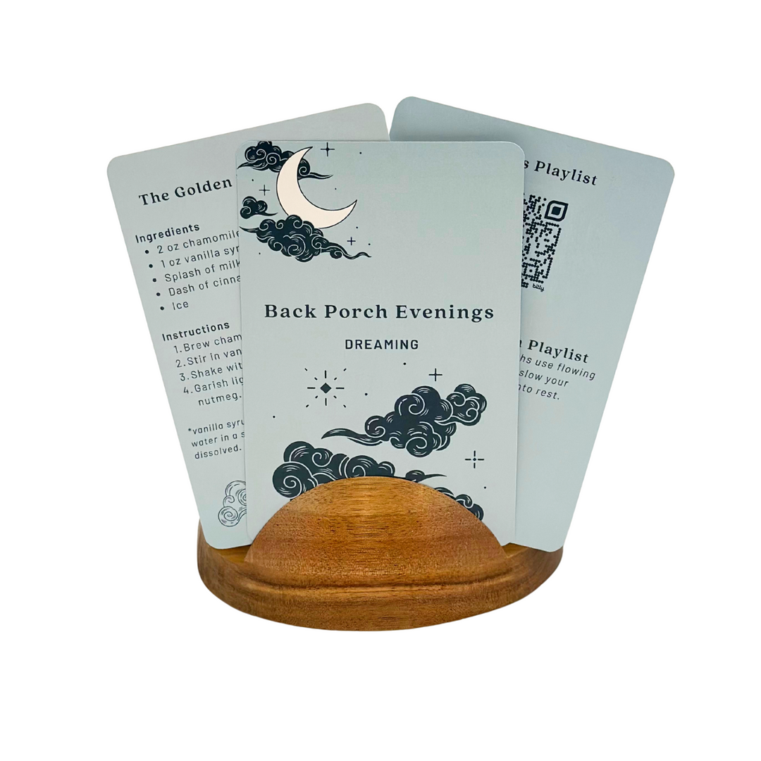Three Back Porch Evenings Dreaming Date Night box guide cards on a wooden stand.